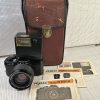Pentax Auto110 Zoom f2.8 20mm~40mm lens w/ Flash, Case and Manual