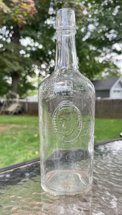 Vintage 1940s Harry E. Wilken Whiskey Bottle, Collectible Clear Glass Liquor Bottle with Embossed Portrait